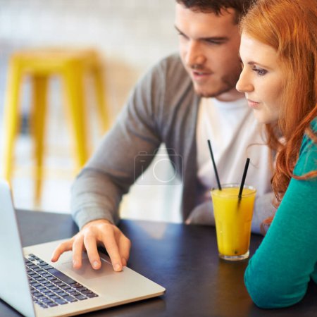 Photo for Couple, man and woman with laptop in cafe with connectivity, internet and drink juice together. People, dating and busy in restaurant with beverage, computer and online with technology for project. - Royalty Free Image