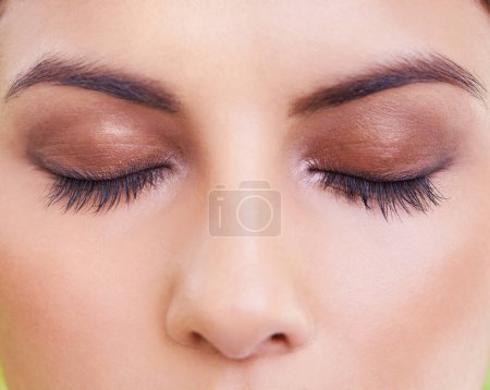 Photo for Eyelashes, face and closeup of woman with makeup, beauty or eyeshadow, shimmer or glow. Eyes, zoom and female model with eyebrow cosmetics, microblading or glamour, aesthetic and lash extensions. - Royalty Free Image