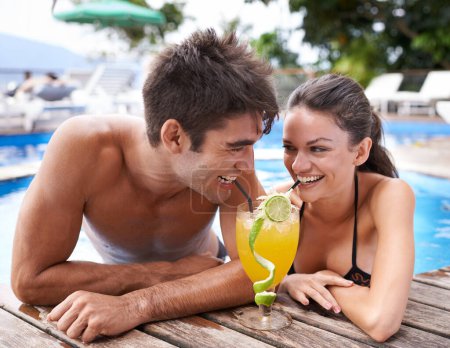 Photo for Swimming pool, cocktail and couple with holiday, sunshine and weekend break with happiness, relax and honeymoon. Summer, man or woman with tropical drink or wet with getaway trip or luxury with water. - Royalty Free Image