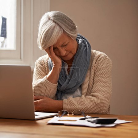 Photo for Senior woman, stress and laptop for bills in home, worry and paperwork for tax return or insurance. Elderly female person, frustrated and documents for retirement plan, fail and mistake in budget. - Royalty Free Image