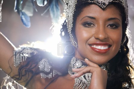 Photo for Woman, confident and portrait of samba dancer at night for carnival season in Rio de janeiro, celebration and happy with costume for culture. Female person, festival and unique fashion with closeup. - Royalty Free Image