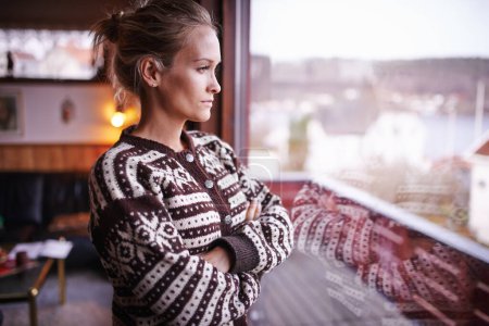 Photo for Confident, woman or window with vision for thinking, planning or ideas for future in Stockholm. Thoughtful, female person and arms crossed for contemplation of questions, solutions and problems. - Royalty Free Image