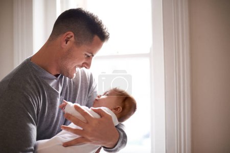 Photo for Father, baby and home window with care, love and support together with family bonding and development. Dad, smile and young child in a house with kid and parent happy and proud about infant growth. - Royalty Free Image
