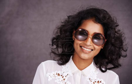 Photo for Studio, smile and fashion for portrait of woman with sunglasses and confidence for Indian girl. Dark background, adult and female person with unique style, relax and aesthetic for proud model. - Royalty Free Image