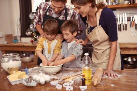 Photo for Family, smile and children baking, learning or happy boys bonding together with parents in home. Father, mother and kids cooking with flour, food and teaching brothers how to make dessert in kitchen. - Royalty Free Image