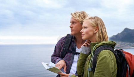 Photo for Couple, thinking and map by ocean for hiking, direction or location on outdoor adventure together in nature. Young man and woman reading tour or travel guide for route, path or destination on hike. - Royalty Free Image