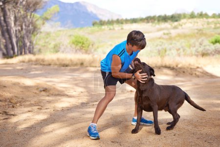 Photo for Fitness, nature and athlete with dog for exercise, healthy training and bonding together in Australia. Trees, runner and man playing with pet companion for outdoor run, workout or wellness in morning. - Royalty Free Image