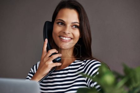 Photo for Telephone call, smile and business woman in conversation, talking or listening to contact in startup office. Landline, happy and secretary on phone, receptionist and creative person in communication. - Royalty Free Image