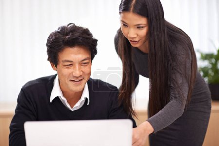 Photo for Help, mentor and teamwork on laptop in office with businessman learning from support of woman. Feedback, advice and manager training asian man on computer in collaboration and reading online research. - Royalty Free Image