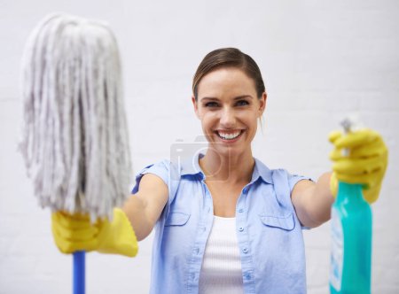 Photo for Mop, spray and portrait of woman in bathroom, cleaning home or hotel with smile. Housework, mission and girl, housekeeper or happy cleaner service washing dirt, germs and sanitation in apartment. - Royalty Free Image