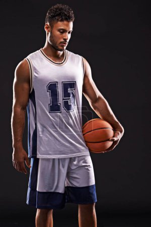 Photo for Man, sports and basketball player in studio for training, competition and fitness on black background. Professional athlete, career and exercise with ball for game, hobby and healthy model in mockup. - Royalty Free Image