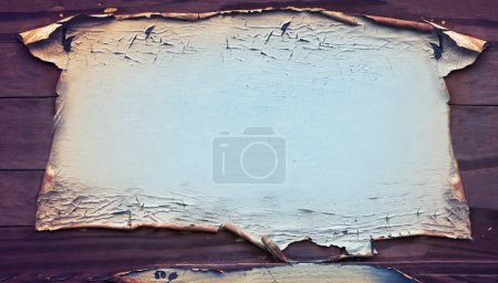 Photo for Old, parchment and paper on table with texture and detail of vintage material and above textile on desk. Wallpaper, peeling and ancient surface with damage from fire with holes with no people. - Royalty Free Image
