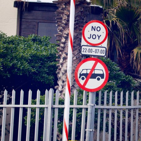 Photo for Road sign, city and urban parking with funny mistake for humor, joke and comic text for soup in neighborhood. Asphalt, error and signage with writing, language and no joy with warning in Cape Town. - Royalty Free Image