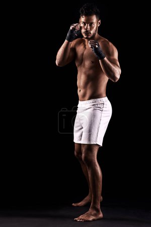 Photo for Fitness, body or portrait of man boxer in studio for power, resilience and training on black background. Fighter, hands by kickboxing male at gym for wellness, energy or exercise, workout or match. - Royalty Free Image
