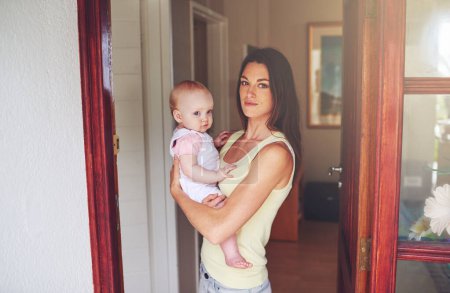 Photo for Door, home and portrait of baby with mother for bonding, parenting and relax together in house. Happy, family and mom carrying newborn infant for child development, support and love in morning. - Royalty Free Image
