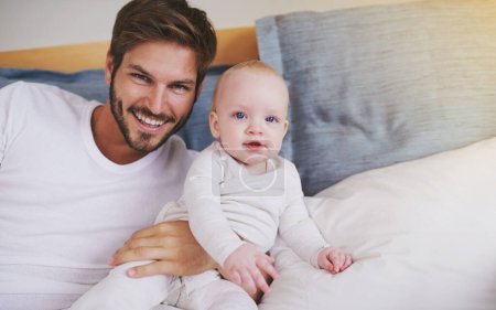 Photo for Bedroom, happy and portrait of father with baby for bonding, relationship and love for parenting. Family, home and dad with newborn infant on bed for child development, support and childcare in house. - Royalty Free Image