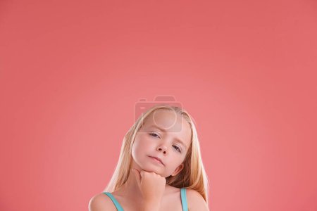 Photo for Planning, ideas and girl child in studio with brainstorming facial expression by mockup space. Thinking, question and young kid model with guess, decision or choice face isolated by pink background - Royalty Free Image