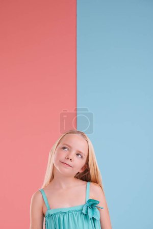 Photo for Thinking, mockup and girl child in studio with brainstorming, ideas or memory facial expression. Planning, question and young kid model with guess, decision or choice face by color block background - Royalty Free Image