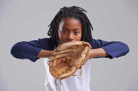 Photo for Sports, baseball and portrait of kid on gray background with glove for training, practice and match. Fitness, youth and young boy with equipment for exercise, playing games and competition in studio. - Royalty Free Image