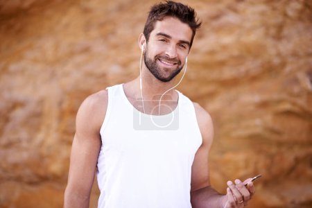 Photo for Workout, headphones and portrait of man with phone for fitness, training and podcast for exercise. Male person, happy and face with earphones for online audio, streaming or music for morning cardio. - Royalty Free Image