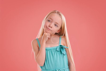 Photo for Thinking, ideas and girl child in studio with brainstorming facial expression by mockup space. Planning, question and young kid model with guess, decision or choice face isolated by pink background - Royalty Free Image
