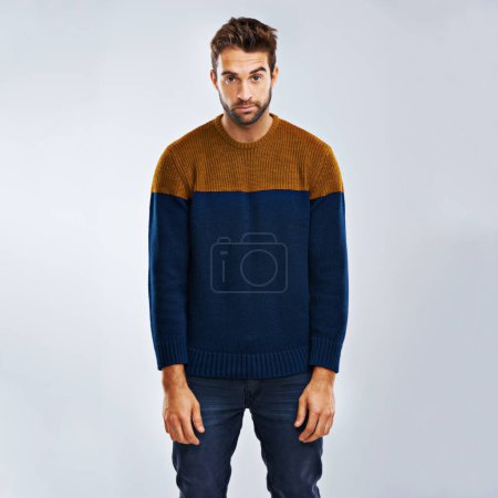 Photo for Man, portrait and bored with fashion in stress, depression or anxiety on a studio background. Young, tired or upset male person with mood, disappointed or mental health in clothing on mockup space. - Royalty Free Image
