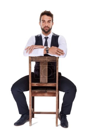 Photo for Chair, serious and portrait of man with suit for fashion, style or formal wear isolated on white background. Male person, gentleman or businessman with trendy clothes, class or outfit in studio. - Royalty Free Image