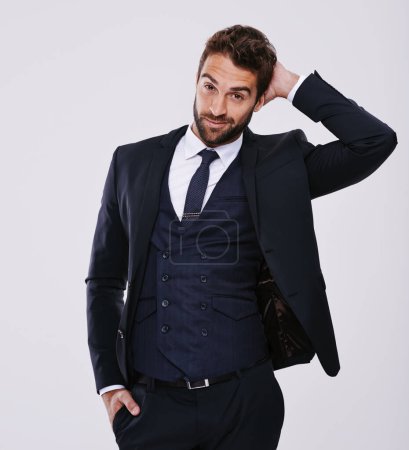 Photo for Man, portrait and fashion with smile in studio with confidence, elegant suit and black tie aesthetic. Suave model, person and face with happiness, stylish clothes or trendy outfit on white background. - Royalty Free Image