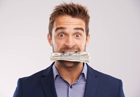 Photo for Portrait, man and cash in his mouth, employee and prize with investment on white studio background. Face, accountant and trading with person biting money and entrepreneur with bonus, rich or salary. - Royalty Free Image