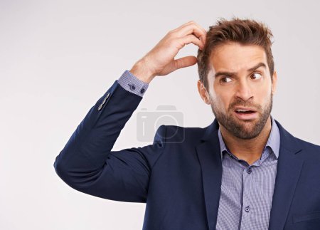 Photo for Confused, businessman and studio portrait worried, puzzled employee with idea for question. Professional, wondering expression for corporate job, thinking and scratching head on isolated background. - Royalty Free Image