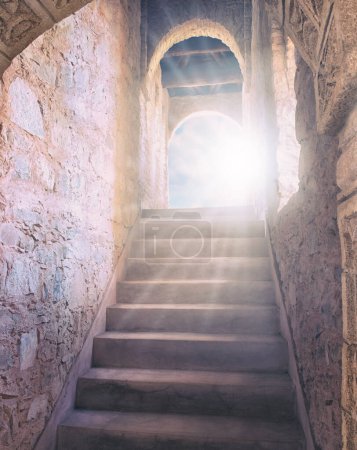 Photo for Underground, staircase and light for guide to eternity or heaven for afterlife, salvation and paradise. Medieval, ancient and steps for spiritual journey or path, walkway and freedom to beyond - Royalty Free Image