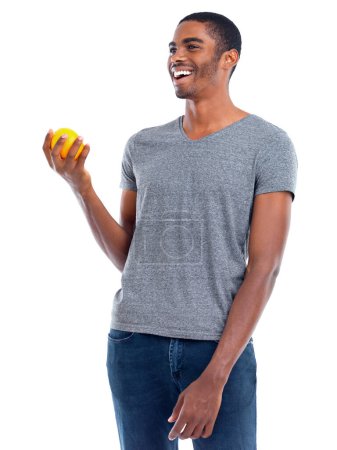 Photo for Man, lemon and fruit for healthy and fresh for diet, immune system and vitamin. African person or dietician and smile with joy for snack, detox and citrus for antioxidant on white background. - Royalty Free Image