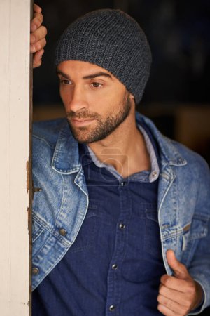 Photo for Thinking, fashion and handsome male person in home, thoughtful and idea in denim. Confidence, relax and pensive for unsure man thinker, beanie or cold weather in England and contemplation or doubt. - Royalty Free Image