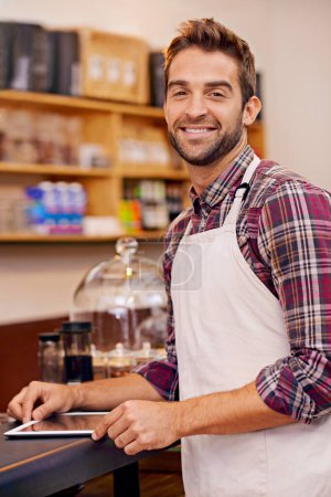 Photo for Man, barista and tablet for portrait in cafe with smile, pride and catering service at startup. Person, waiter and business owner on digital touchscreen for stock, ecommerce and order in coffee shop. - Royalty Free Image