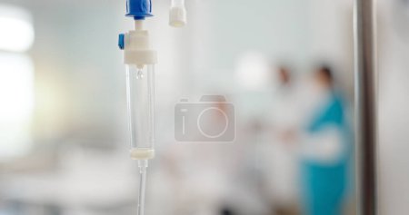 Photo for IV drip, liquid and medicine in a hospital for healthcare, virus or help in an emergency. Health, clinic and a fluid, solution or drug for medical treatment, therapy or infusion for a disease. - Royalty Free Image