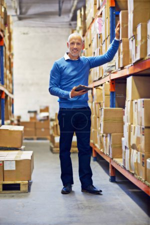 Photo for Boxes, tablet or portrait of man in factory for stock info for delivery order by shelf in warehouse. Check, inventory or happy mature manager with product, package or cargo shipping for distribution. - Royalty Free Image