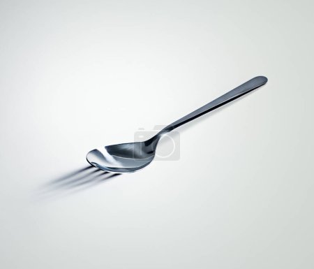 Photo for Spoon, shadow and fork with mockup space, utensils and kitchen tool on a white studio background. Promotion, design and metal with artistic expression and bizarre with reflection, steel and mystery. - Royalty Free Image