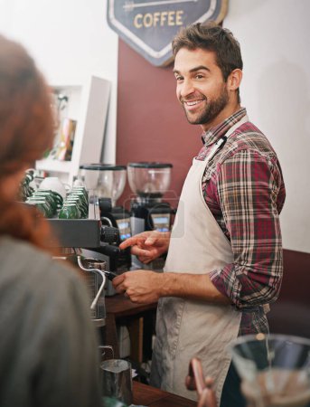 Photo for Happy man, waiter and talking to customer in coffee shop with machine for order, service or catering. Barista, client or patron in cafe for drink, tea or espresso with smile, chat or helping in Italy. - Royalty Free Image
