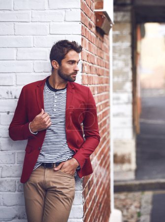 Photo for Fashion, thinking and man in city for travel on vacation, adventure or holiday with confidence. Pride, stylish and person with trendy, cool and casual outfit with ideas in urban town for weekend trip. - Royalty Free Image