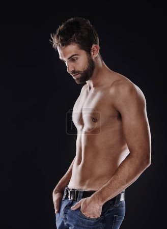 Photo for Thinking, muscle and body of man in studio isolated on black background for wellness, fitness or mockup space. Confidence, topless and abs of person for health, serious or strong bodybuilder in jeans. - Royalty Free Image