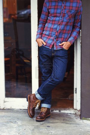 Photo for Fashion, outfit and urban for male person, city and clothing for cold season. Confidence, house and style with trendy clothes for explore in New York, autumn and outdoors for trip or vacation. - Royalty Free Image