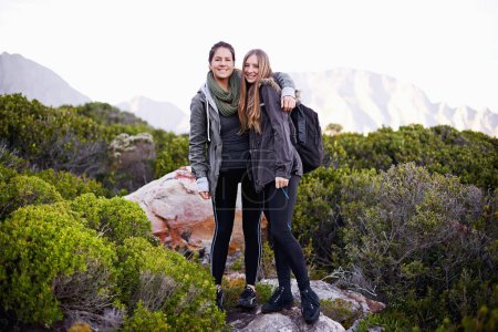 Photo for Woman, friends and portrait for mountain trekking or nature adventure for wellness journey, hiking or training. Female people, face and fitness healthy for explore in South Africa, workout or travel. - Royalty Free Image