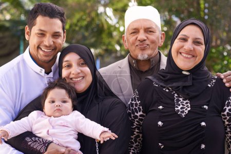 Photo for Islamic, family and man with woman , portrait and outdoor with baby, grandparents and smile in park. Adult, mother and father of child in garden for growth and development of kid or toddler and girl. - Royalty Free Image