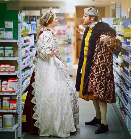 Photo for Supermarket, argument and royal couple with costume for food choice, grocery shopping or product. Convenience store, king and queen in victorian outfit for purchase, decision or customers in dispute. - Royalty Free Image