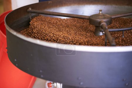 Coffee beans, machine and factory for roast, product and cooling tray for flavor, export or quality assurance. Plant, metal container and caffeine manufacturing with organic stock for sustainability.