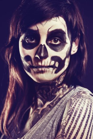 Photo for Skull, makeup and portrait of woman in studio for festival, Halloween and day of the dead. Creative art, costume and person with face paint for horror, scary and gothic aesthetic on black background. - Royalty Free Image