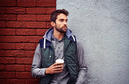 Photo for Fashion, wall or man with coffee thinking of casual clothes, style or edgy hoodie for winter outdoor outfit. Tea, cool model or stylish person in urban town in streetwear or trendy jacket in Italy. - Royalty Free Image