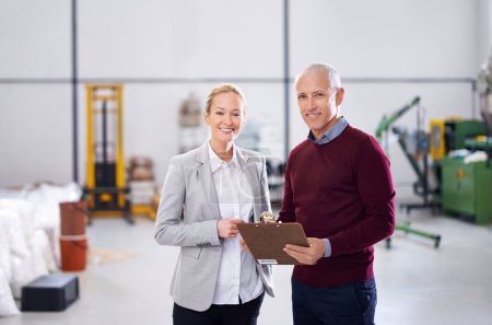 Photo for Checklist, teamwork or portrait of people in warehouse for stock in workshop, supply chain or production. Woman, clipboard or happy managers in factory for industrial process, inspection or resources. - Royalty Free Image