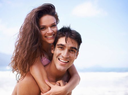 Photo for Piggyback, ocean and portrait of couple at beach on vacation, adventure or holiday for romantic travel. Happy, love and young man and woman on date by sea for tropical anniversary weekend trip - Royalty Free Image