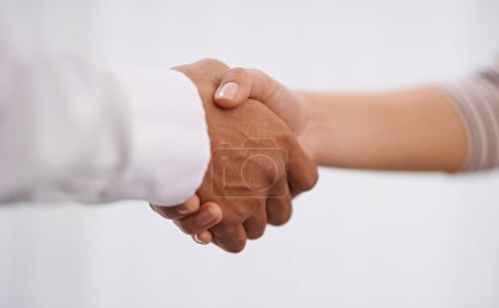 Photo for Business people, handshake and meeting with partnership in deal, b2b or agreement together at office. Closeup of employees or colleagues shaking hands for greeting, thank you or teamwork at workplace. - Royalty Free Image